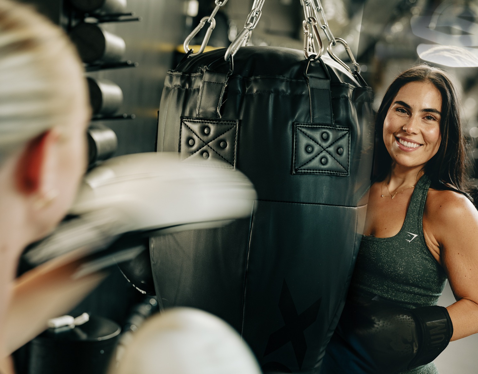 Members working the heavy bags