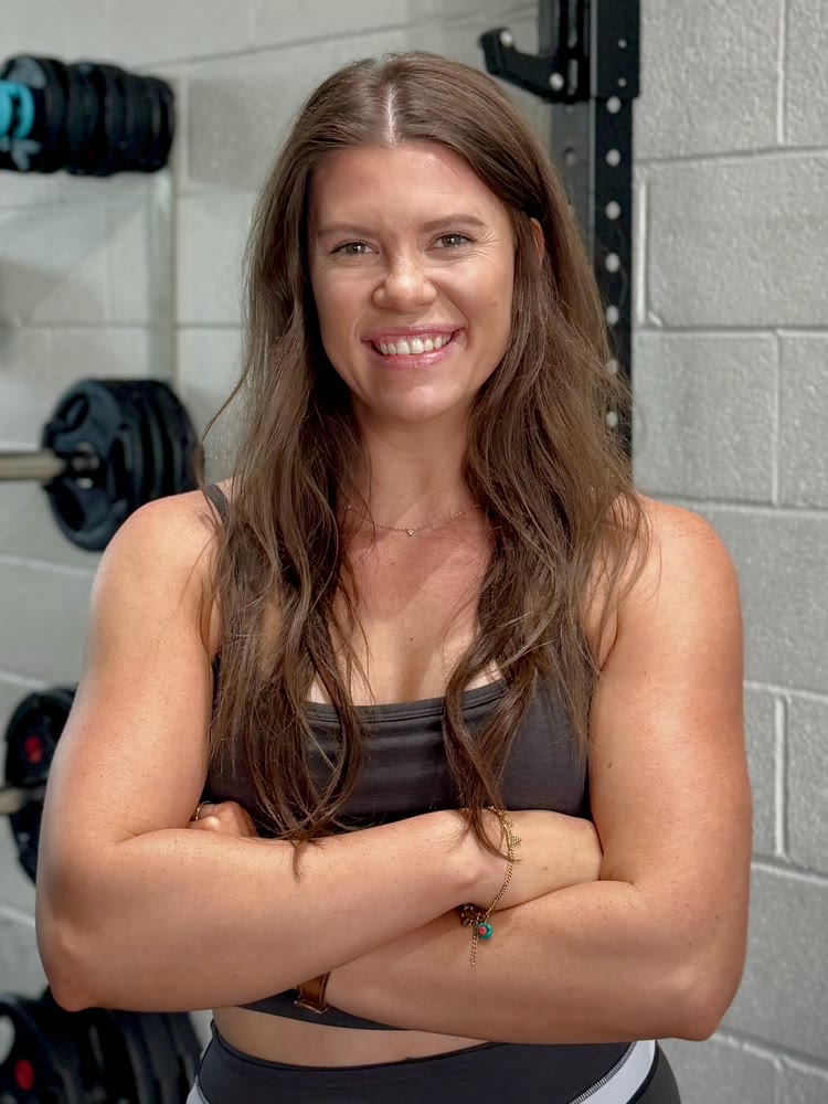 Coach Chloë Woest
