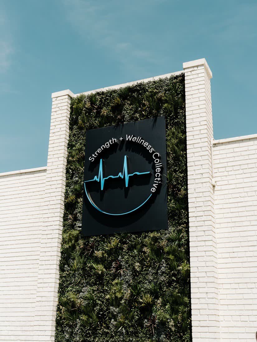 The SWC studio exterior with its living wall sign